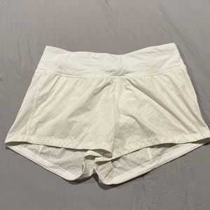 White Lululemon athletic shorts